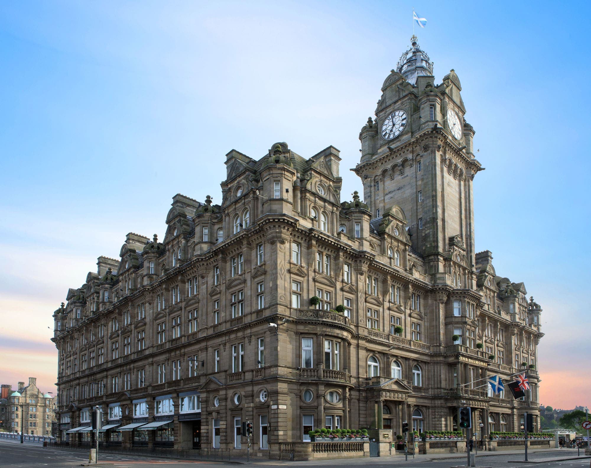 Architectural façade detail of The Balmoral showing Victorian Scottish Baronial stonework and canted bays